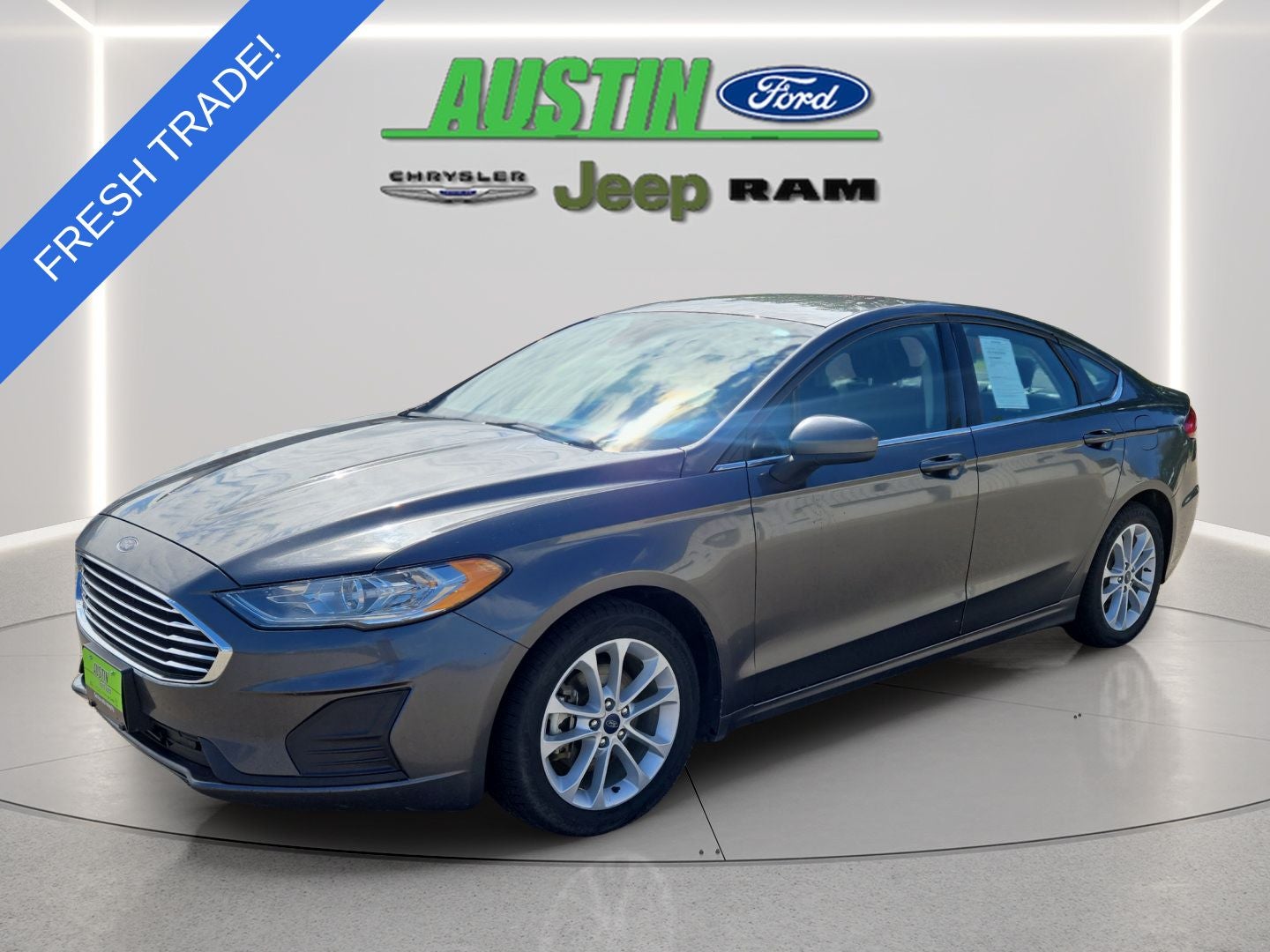 2020 Ford Fusion Hybrid SE in Magnetic — front three-quarter view